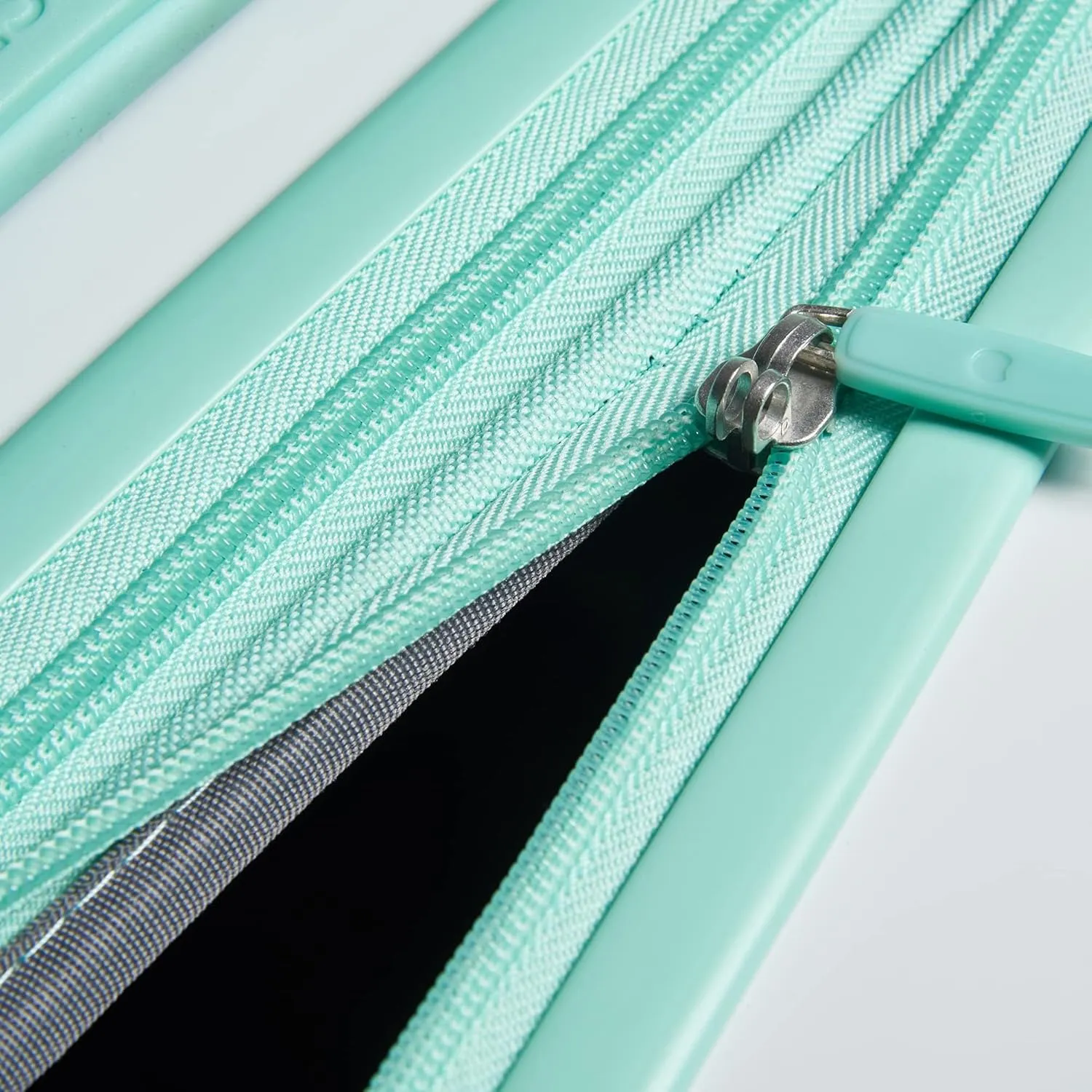 DELSEY PARIS Christine Expandable Luggage, fashionable and Unique, Glossy Exterior with 360 Spinner Wheels, Lockable Telescoping Handle, Men and Women, White with Teal Trim, Large Check-In 28-Inch